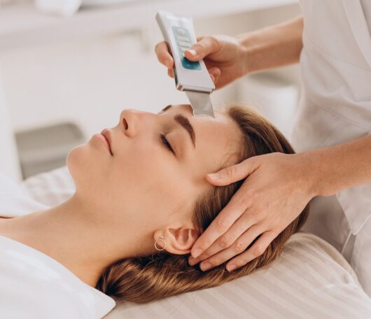 woman-having-beauty-treatment-procedures-salon